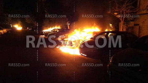 مجهولون يضرمون النار بسيارات شرطة بمدينة نصر