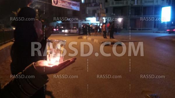 وقفة بالشموع بـ”الفيوم” منددة بأزمة الكهرباء