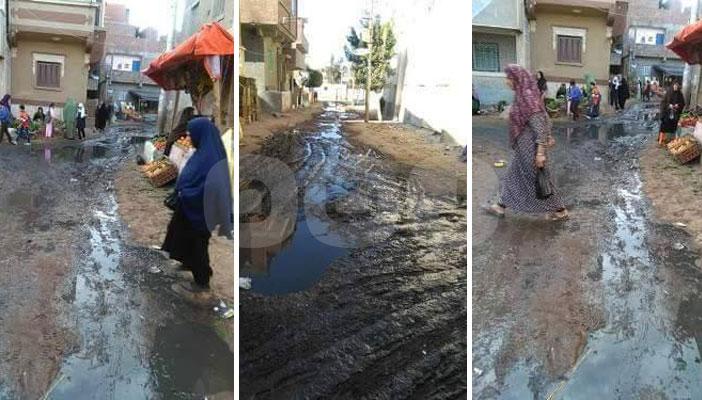 بالصور.. مياه الصرف الصحي تغرق شوارع المحمودية في البحيرة