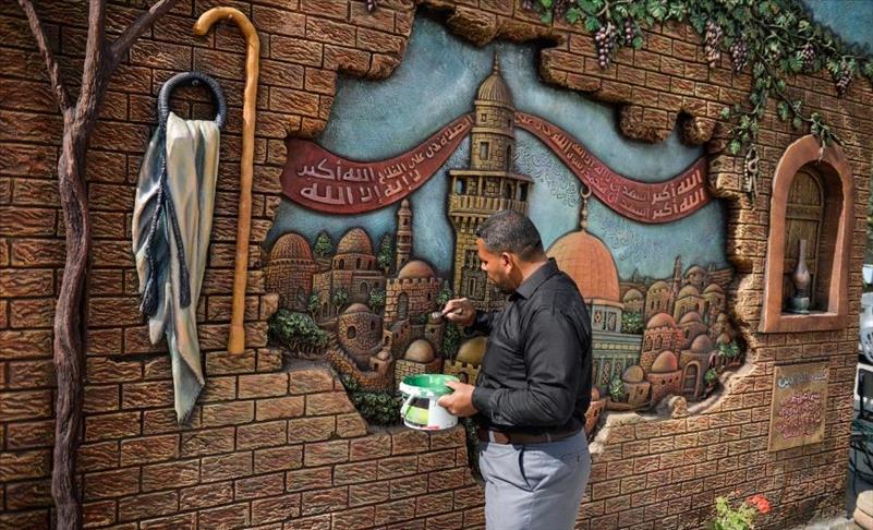 “لن يصمت الآذان”.. جداريات إسمنتية في غزة تنطق بهموم الوطن