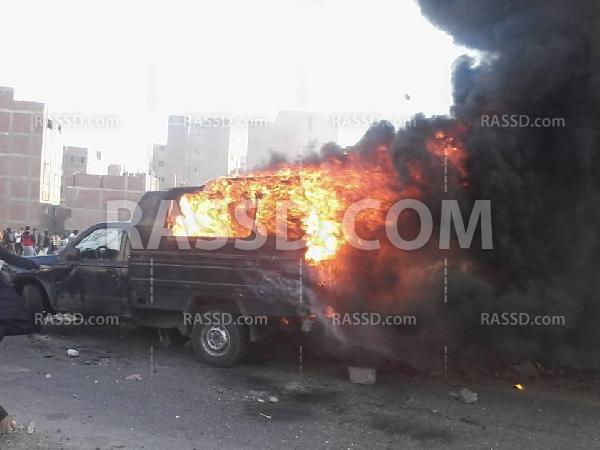 إشعال النيران بسيارة”بوكس”على الطريق الدائرى بالهرم