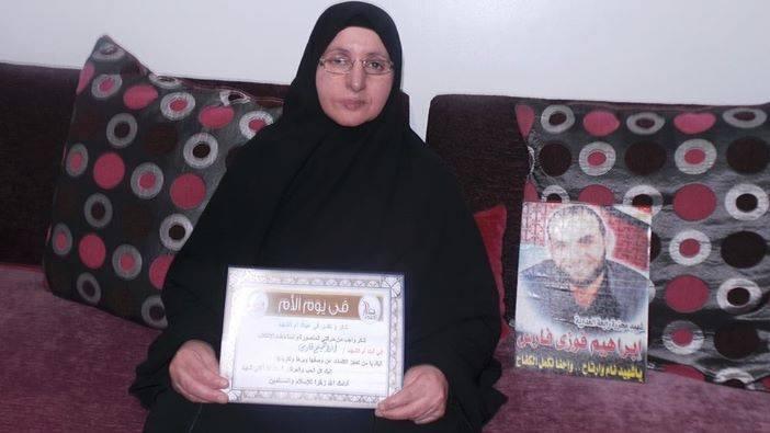 تكريم والدة الشهيد إبراهيم فوزى فى يوم الأم بالدقهلية