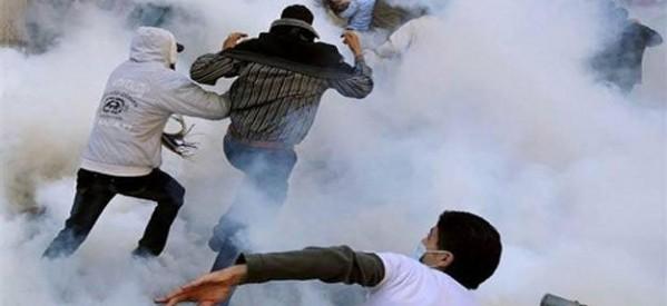 “الأمن” يطلق الغاز بعد محاولة اقتحام “القضاء العالي”