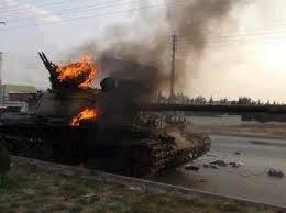 قصف مستمر بالبراميل المتفجرة على حلب ومعارك بإدلب