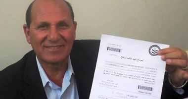 بالصور.. محافظ الوادي الجديد يحرر توكيلا انتخابيا للسيسي