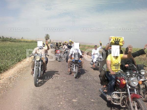 مسيرة بالدراجات النارية منددة بالانقلاب العسكري بقنا