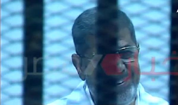 فيديو..مرسي يضحك أثناء فض الأحراز