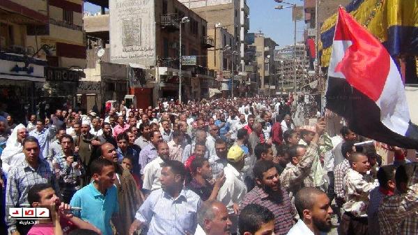 بالصور .. المئات يتظاهرون في أسيوط لتطهير القضاء