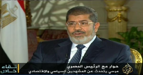 مرسي يلمح في حواره على الجزيرة بأن إسرائيل عدو