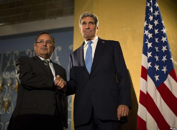 “فهمي” يغادر لأمريكا بعد إقرار “كيري” بانحراف مصر عن الديمقراطية