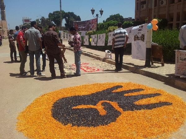 معرض طلابى لتوثيق مجزرتى رابعة والنهضة بـ”هندسة منوف”