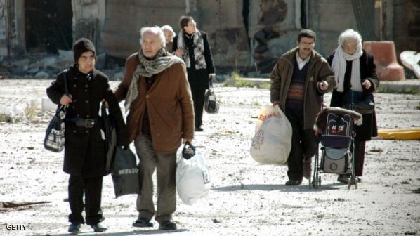 بدء إجلاء مقاتلي المعارضة والمحاصرين بحمص