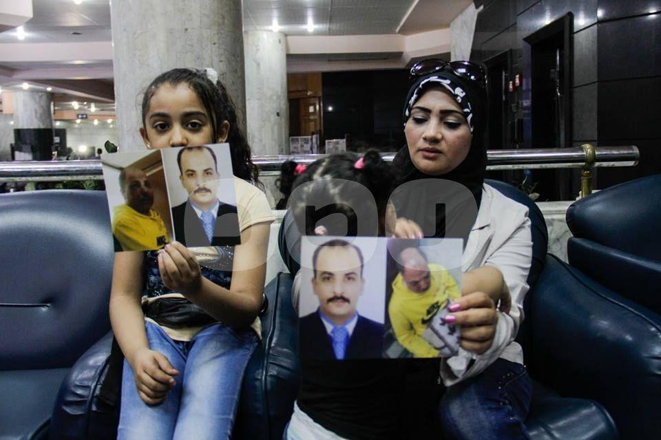 بالصور.. زوجة صحفي تستغيث من معاون مباحث الهرم