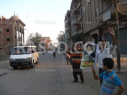 سلسلة بشرية للتحالف الوطني بطريق الناصرية بالغربية