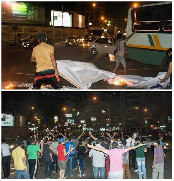 شباب ضد الانقلاب يحرقون لافتات السيسي بالاتحادية