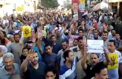 مسيرة بدلجا بالمنيا تدعو لمقاطعة انتخابات العسكر