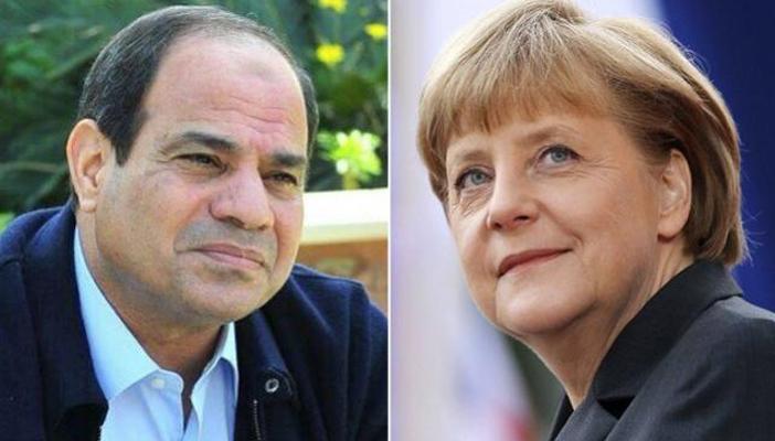 خبراء وسياسيون: تأجيل حكم مرسي بسبب زيارة السيسي لألمانيا