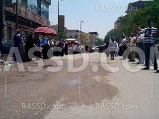 سلسلة بشرية بـ”حدائق حلوان” رفضًا للانقلاب العسكري