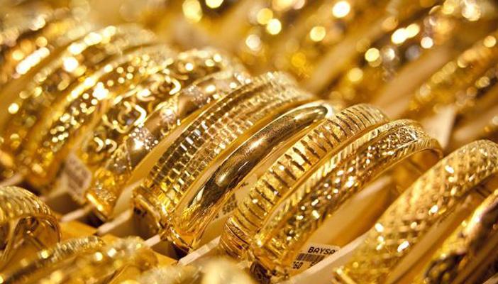 تراجع الذهب والعملات واستقرار الحديد والأسمنت