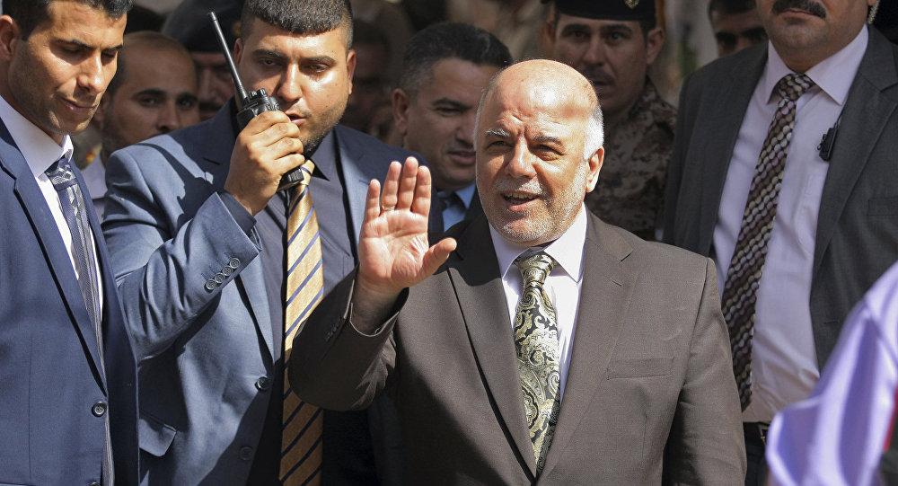 بالفيديو.. طرد رئيس الوزراء العراقي بالأحذية من مكان تفجير الكرادة