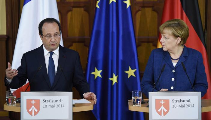 ميركل وهولاند يدعوان لعقد قمة عاجلة لـ”اليورو” حول استفتاء اليونان