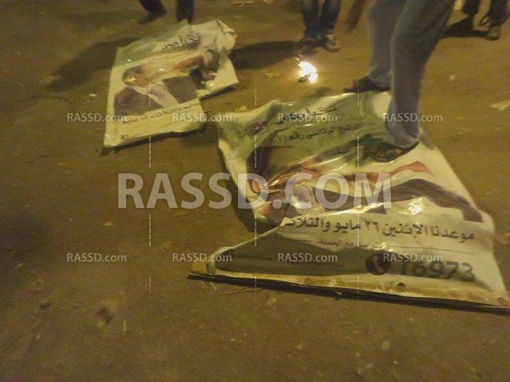 مسؤول حملة السيسي يحرق صوره غضبا من مقتل ابن قريته