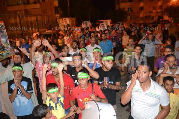 مسيرة للقوى الشعبية بالخارجة رفضا للانقلاب العسكري