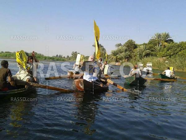 مسيرة بـ”القوارب النيلية” رفضًا الانقلاب في ‫”‏قنا‬”