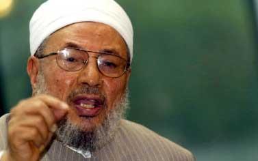 القرضاوي : المشاركة في تأييد «مرسي» فرض عين