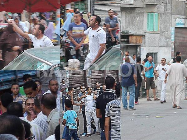 بالصور.. بلطجي يعتدي على متظاهري الاسكندرية