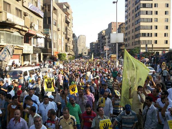 مسيرات الجيزة تتجمع في شارع جامعة الدول