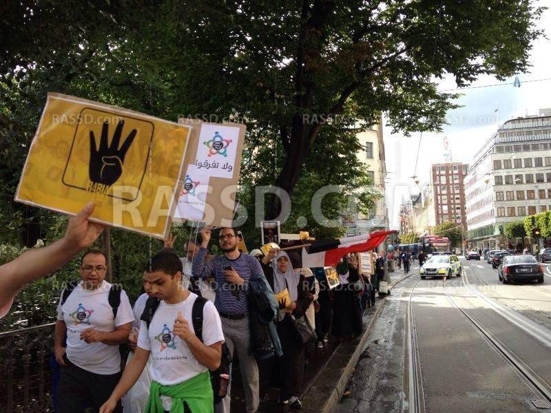 شعار «رابعة» يظهر في السويد رفضاً للانقلاب العسكري