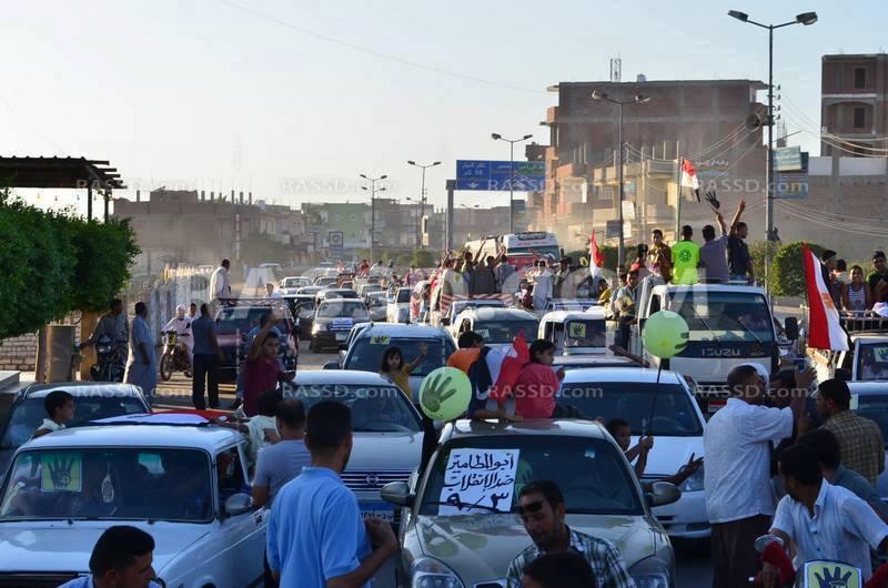 مسيرة بالسيارات والدراجات البخارية لرفض الانقلاب بالبحيرة