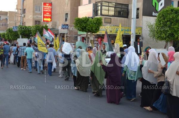صور | مسيرة في “برج العرب” رفضًا للانقلاب