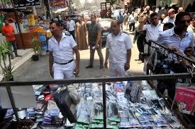 إزالة الإشغالات بميدان الجيزة وملاحقة الباعة في الشوارع