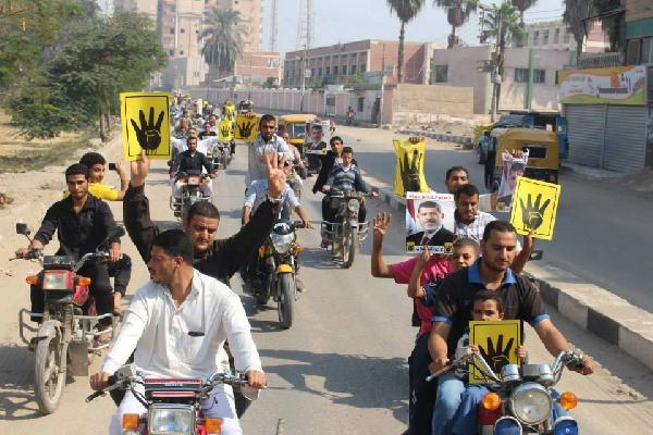 مسيرة بالدراجات النارية بالفيوم تنديدا بقمع الانقلاب