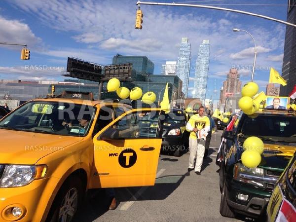 بالصور..إشارات “رابعة” تتلألئ بسماء نيويورك