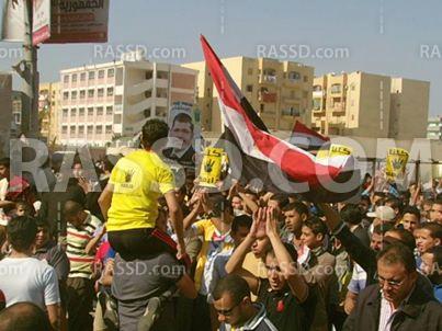 آلاف الأهالي أبو حمص يحتشدون رفضًا لمحاكمة الرئيس الشرعي