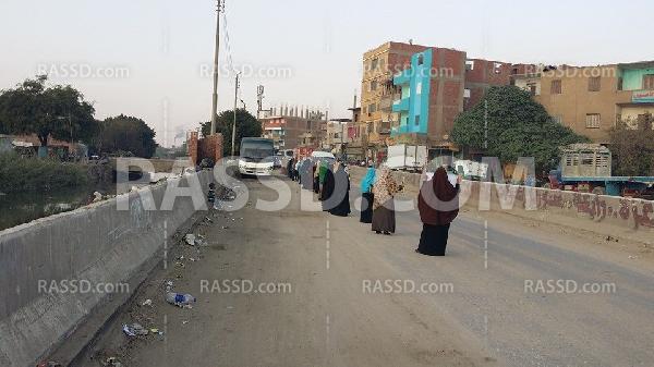 صور| سلسلة بشرية لـ”نساء” قرية مزغونة بالجيزة