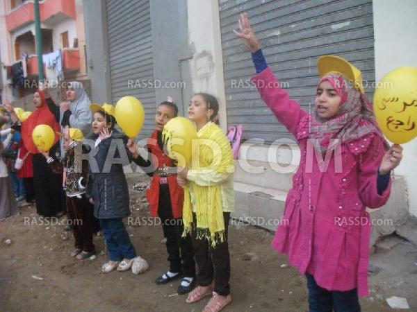 مع هطول الأمطار “نساء ضد الانقلاب ” تنظم وقفة بالغربية