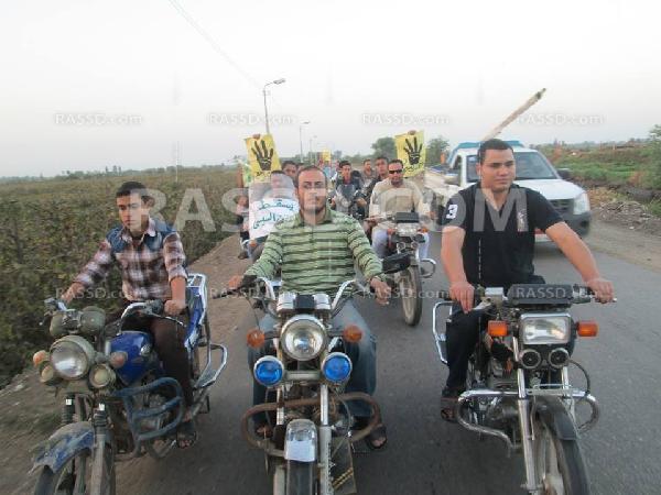 مسيرة بالدرجات البخارية رفضا للانقلاب بالغربية