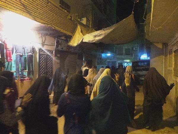 صور| مسيرة ليلية بـ”المنيا” بأسبوع “الله أكبر.. إيد واحدة”