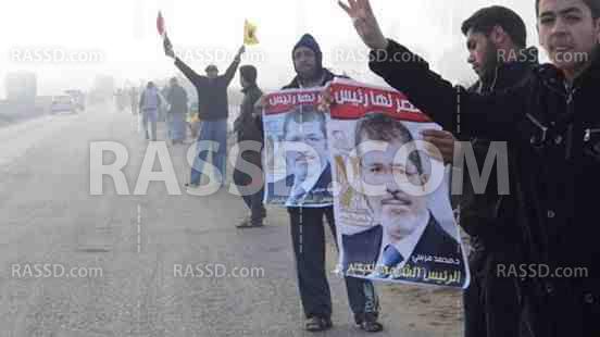 سلسلة بشرية على طريق أبو قير كفر صقر تنديدًا بحكم العسكر