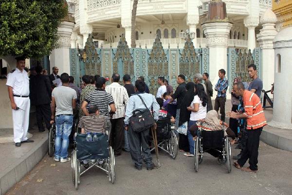 الانقلاب يلغي معاش المعاقين الذي طبقه الرئيس مرسي ويطالبهم برده